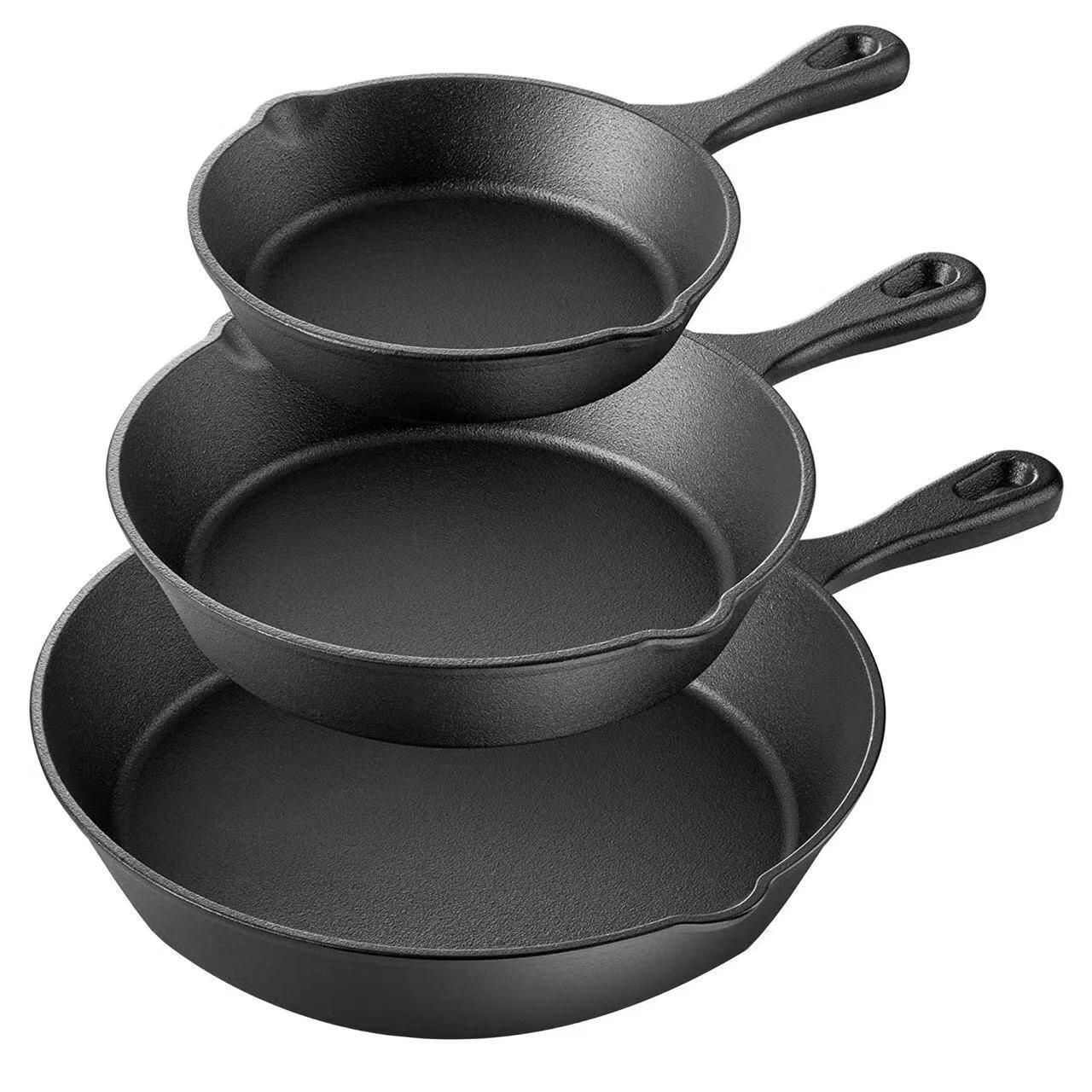 Set of 3 pre-seasoned cast iron skillets with pour spouts and convenient dual handles, suitable for both indoor and outdoor cooking.