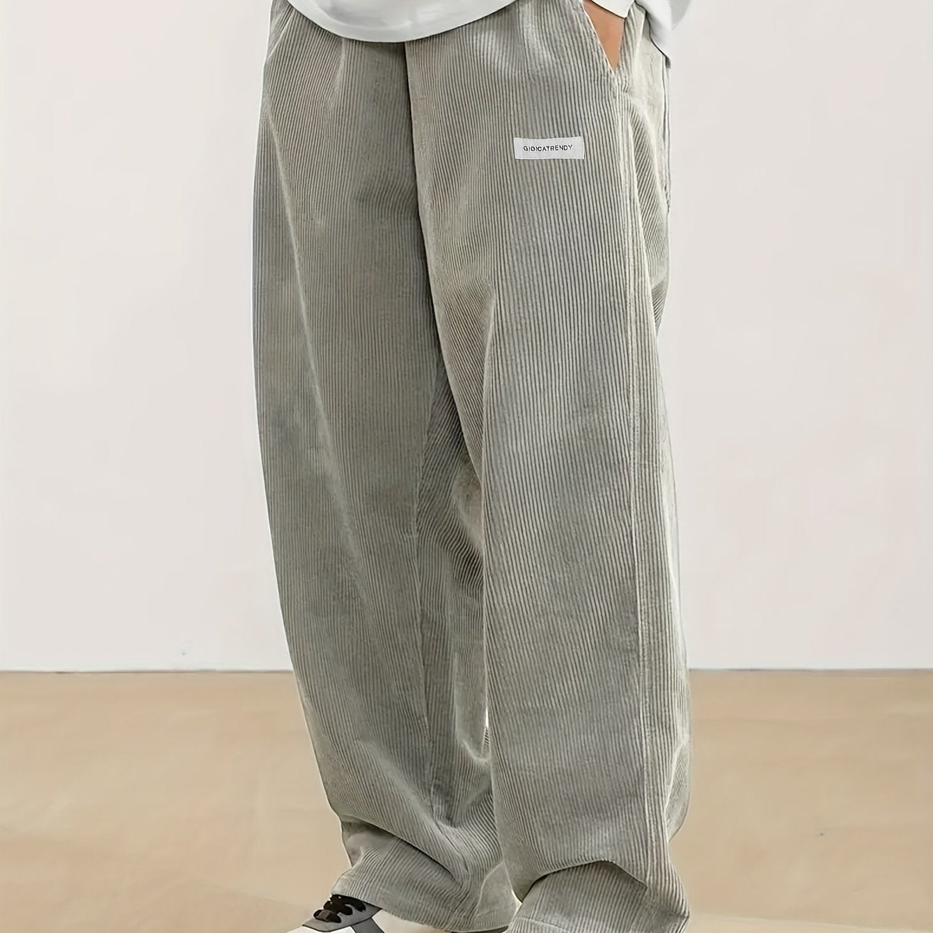 Men's casual corduroy pants with drawstring waist, ideal for outdoor activities and commuting.