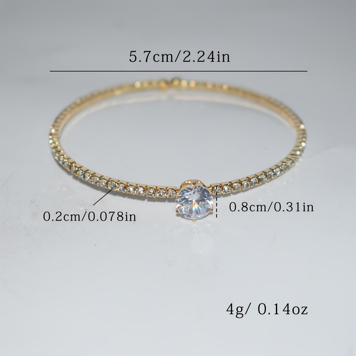 Elegant silvery-plated bracelet with cubic zirconia in classic single row design for weddings and everyday glam.