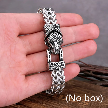 The Stainless Steel Viking Snake Head Bracelet for Men is built to last, with a fade-resistant, intricate design that exudes a punk rock style. A perfect gift for the fashion-forward man in your life, this dominant piece of jewelry will never lose its