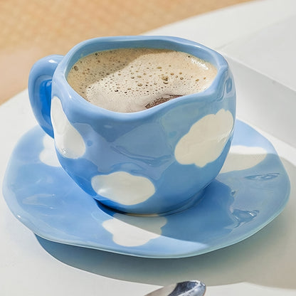 Cloud-shaped ceramic coffee mug with saucer - reusable, handwash only, ideal for breakfast & office use - great gift idea.