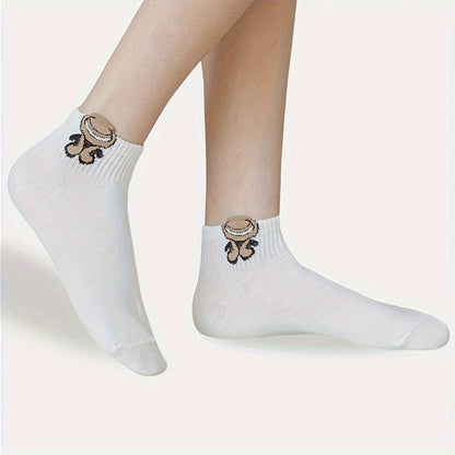 5 pairs of cute and soft white cartoon print short socks for women, made of breathable material.