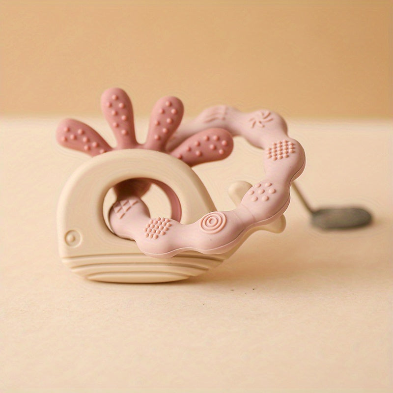 Chewable soothing toy in adorable whale shape for babies aged 0-3 years.