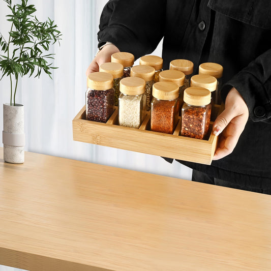 The spice rack includes either 12 or 24 jars with bamboo lids, as well as a bamboo drawer organizer complete with attached waterproof adhesive labels specifically designed for English herbs, spices, and condiments for convenient and easy access.