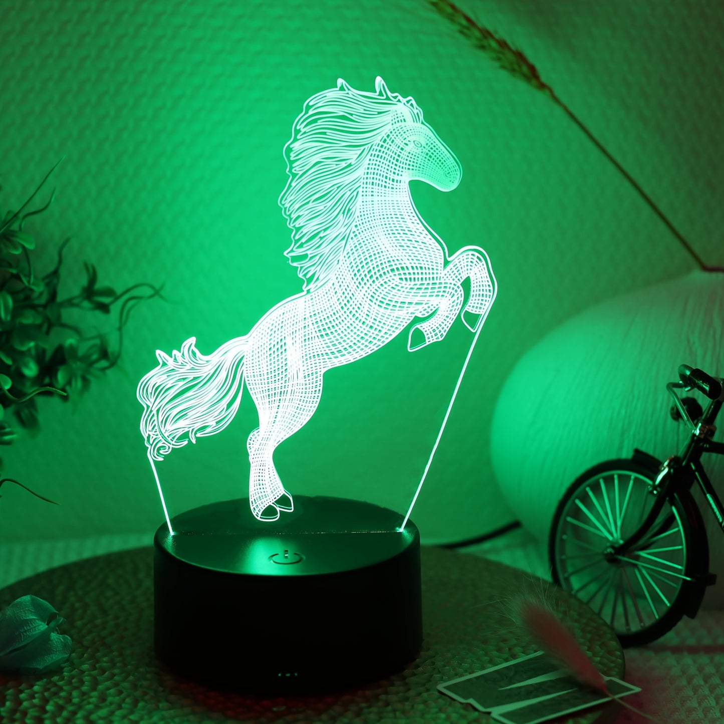 The 1pc Plug-in 3D Night Light is a creative jumping horse decoration for desks or bedrooms.