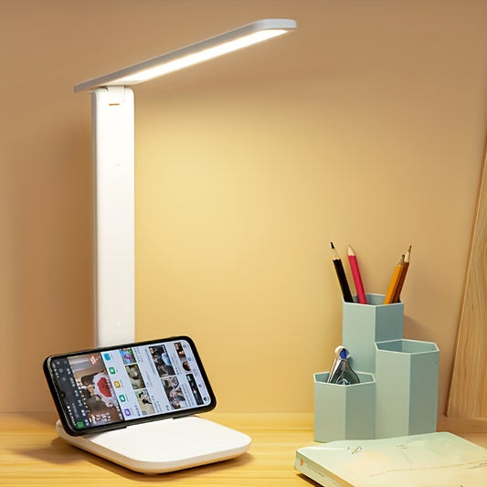 Dimmable desk lamp with 3 levels of touch dimming, eye-care LED, cell phone holder, night light, USB plug-in, ideal for study rooms.