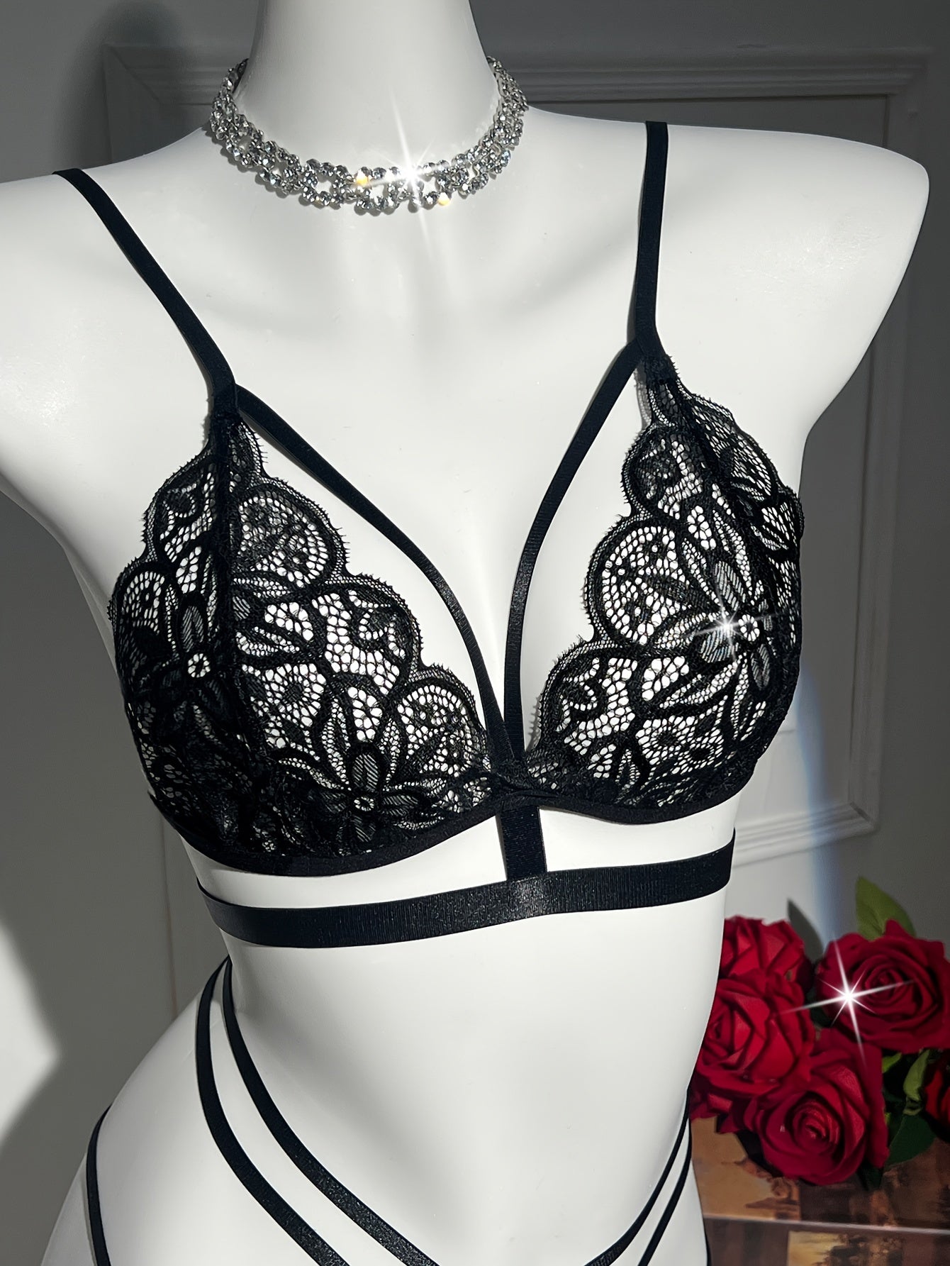 Sexy floral lace lingerie set includes a cut-out push-up bra and strappy thong.