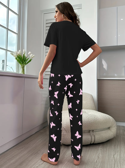 Short-sleeve top and shorts set with hearts, butterflies, and four-leaf clovers pattern, for sleepwear and loungewear.