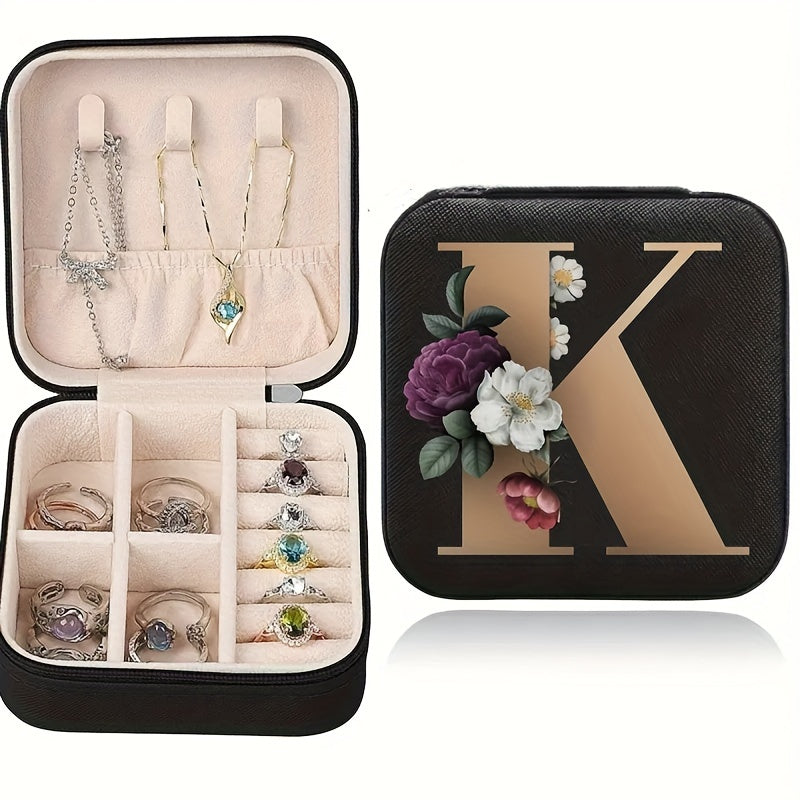 Floral initial jewelry organizer box with compact design, soft velvet lining, durable zipper, and lightweight, ideal for jewelry organization and travel.