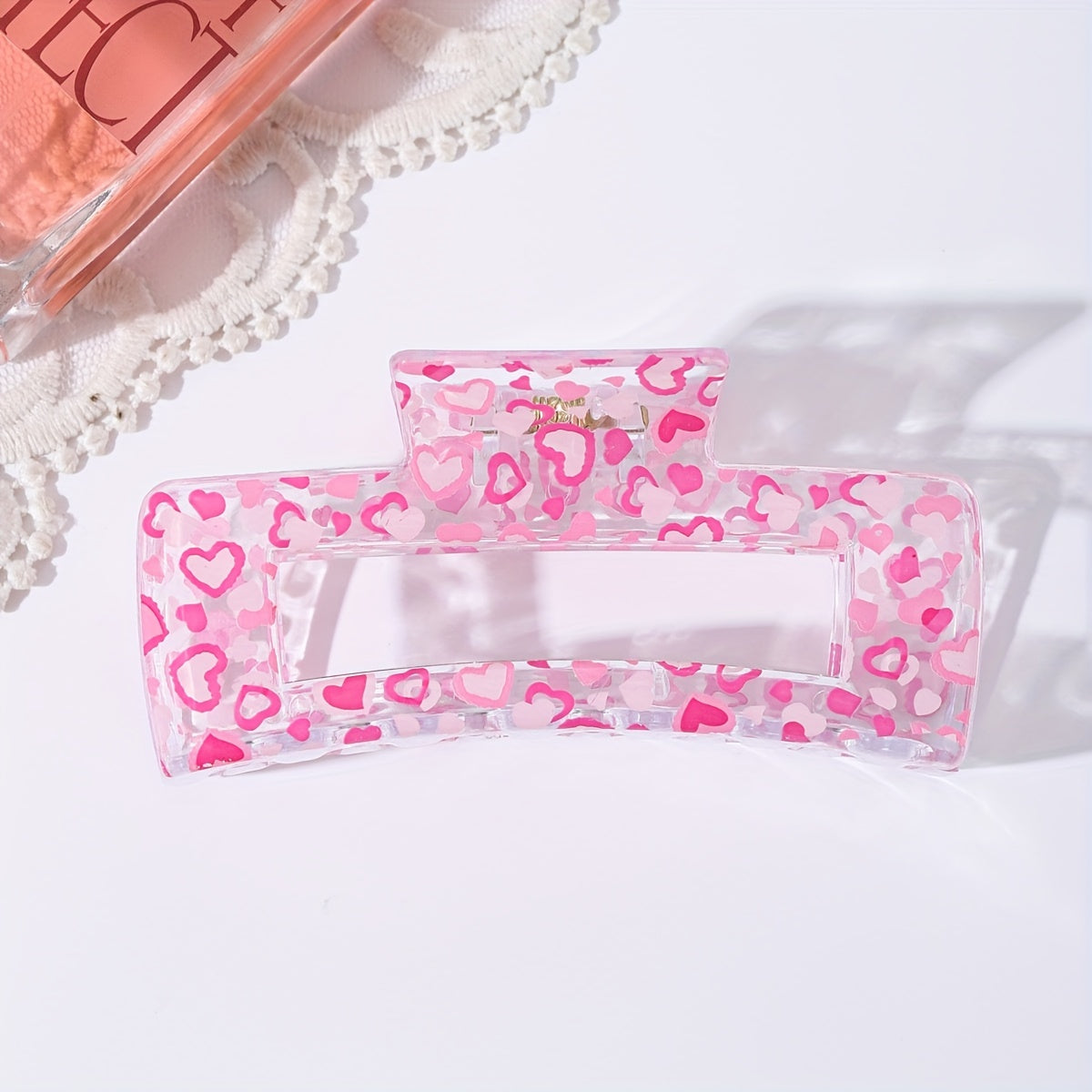 High-end and fashionable dopamine style claw clips in pink love and rose red patterns, rectangular plastic hair grippers. Suitable for daily wear, outings, hair styling, washing face