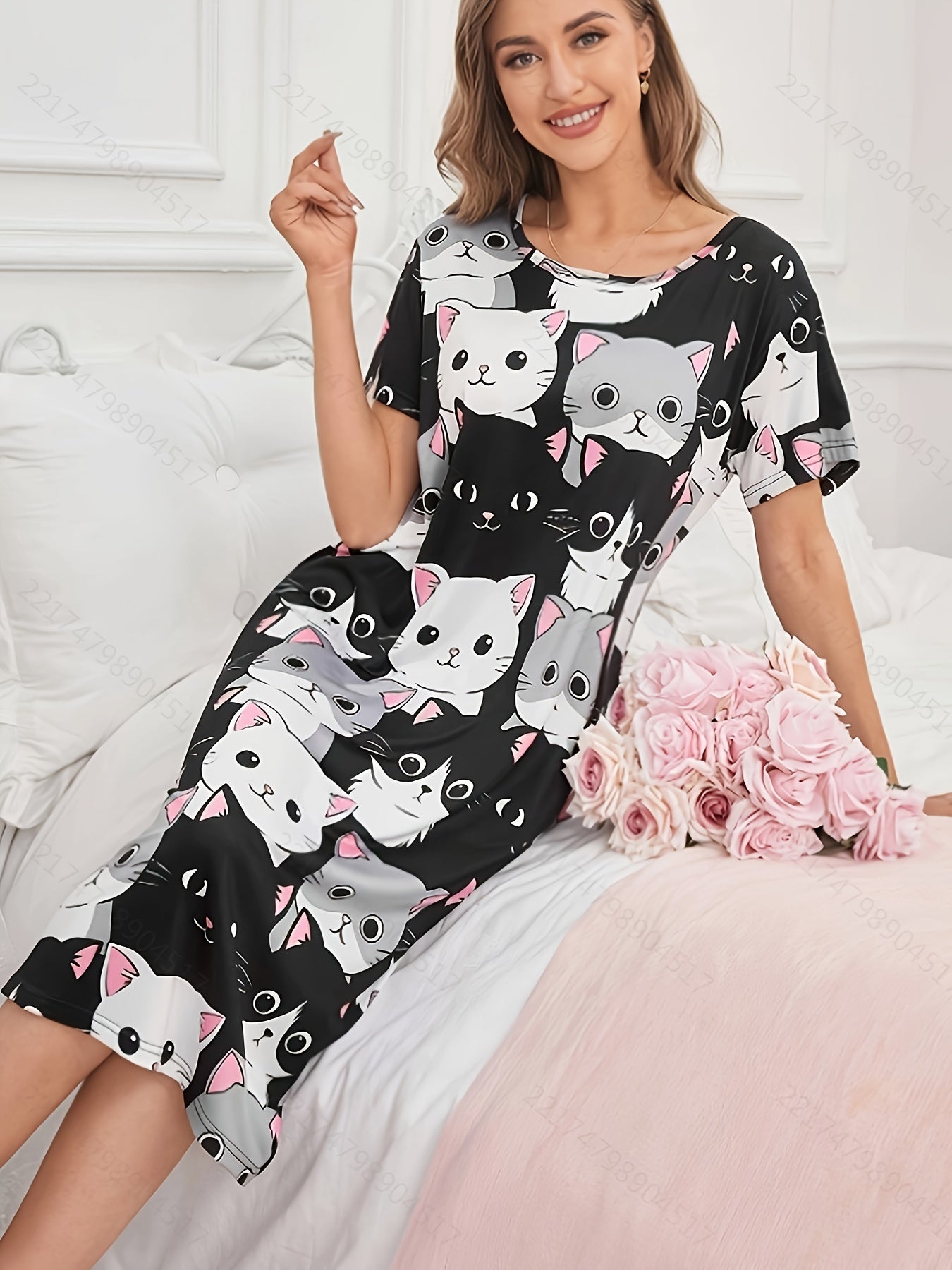 Women's knee-length sleep dress with cute cat print, made of soft polyester and elastane blend. Machine washable and perfect for all seasons.