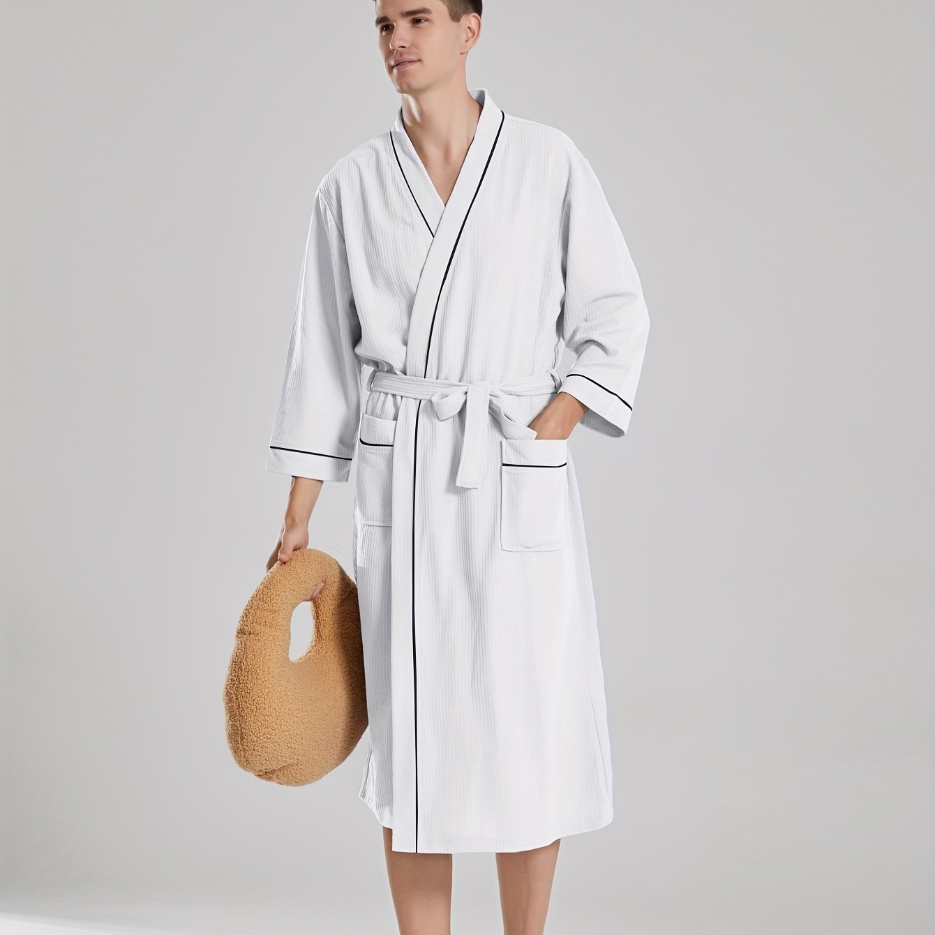 Unisex Japanese-style bathrobe with waffle weave, pockets, and belt for all-season comfort.