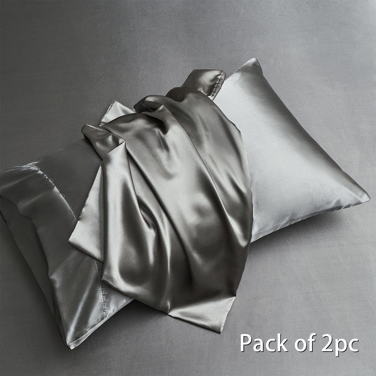 Two pieces of satin pillowcases available in solid colors perfect for the living room or bedroom. Pillow inserts are not included.