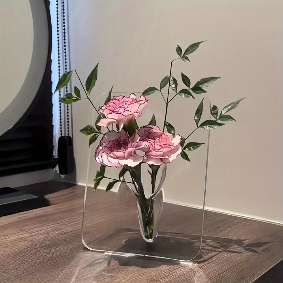 Art Deco-style acrylic resin bud vase with geometric transparent oblong design. Doubles as a creative picture frame. Ideal for home or office décor. Makes a great small gift (flowers not included).