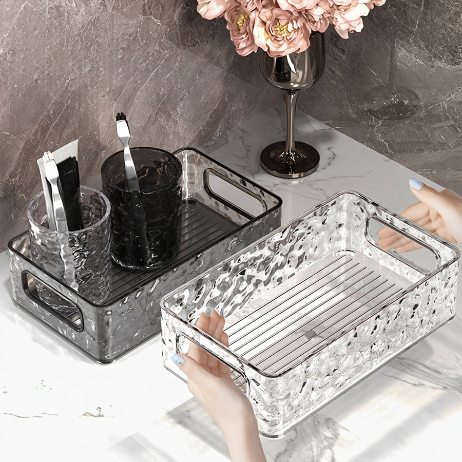 Clear water ripple plastic storage basket perfect for organizing makeup, skincare, snacks, and bathroom accessories. Ideal for back to school and dorm essentials.