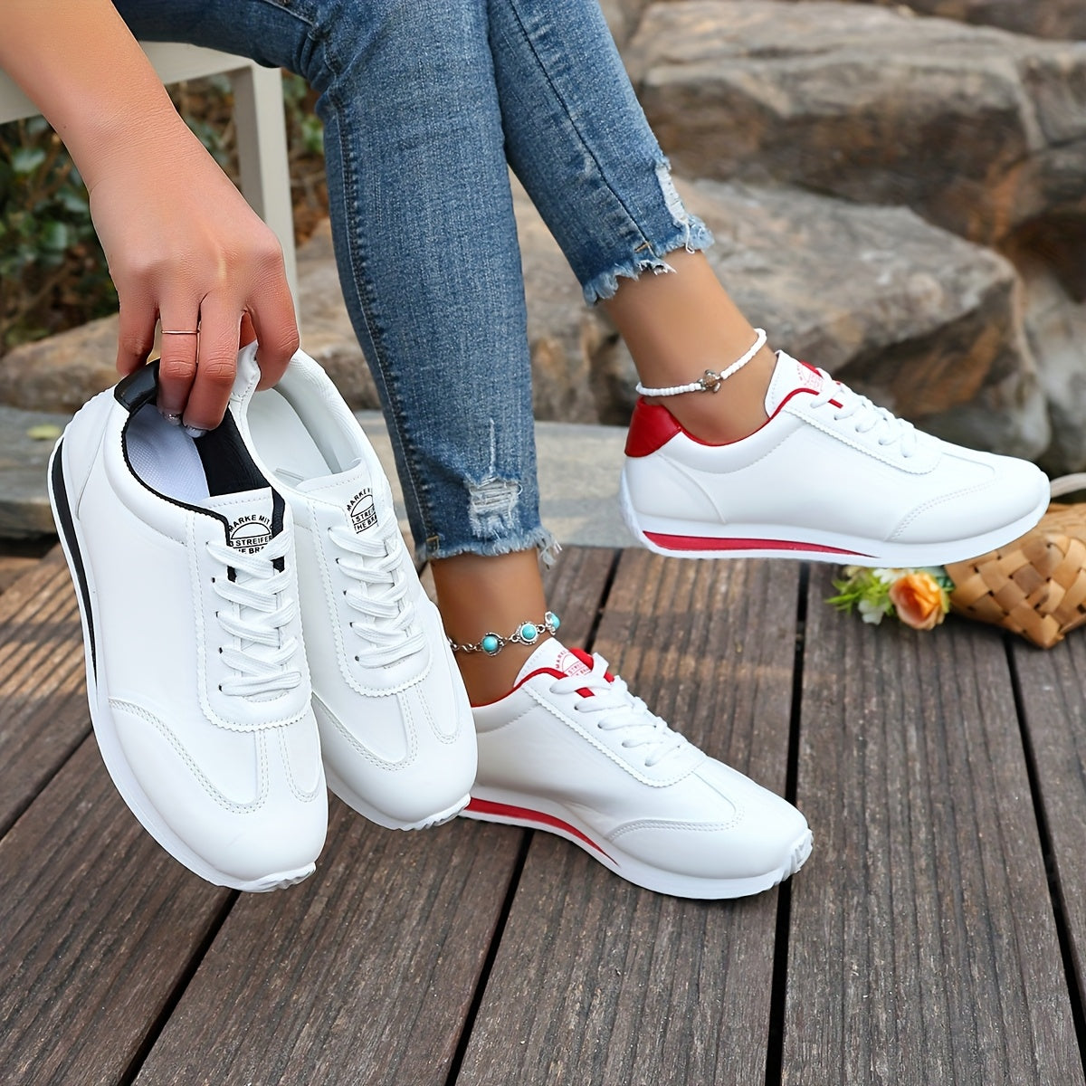 White synthetic leather women's casual sneakers with stability support, all-season comfort, and breathable fabric lining. Perfect for casual attire.