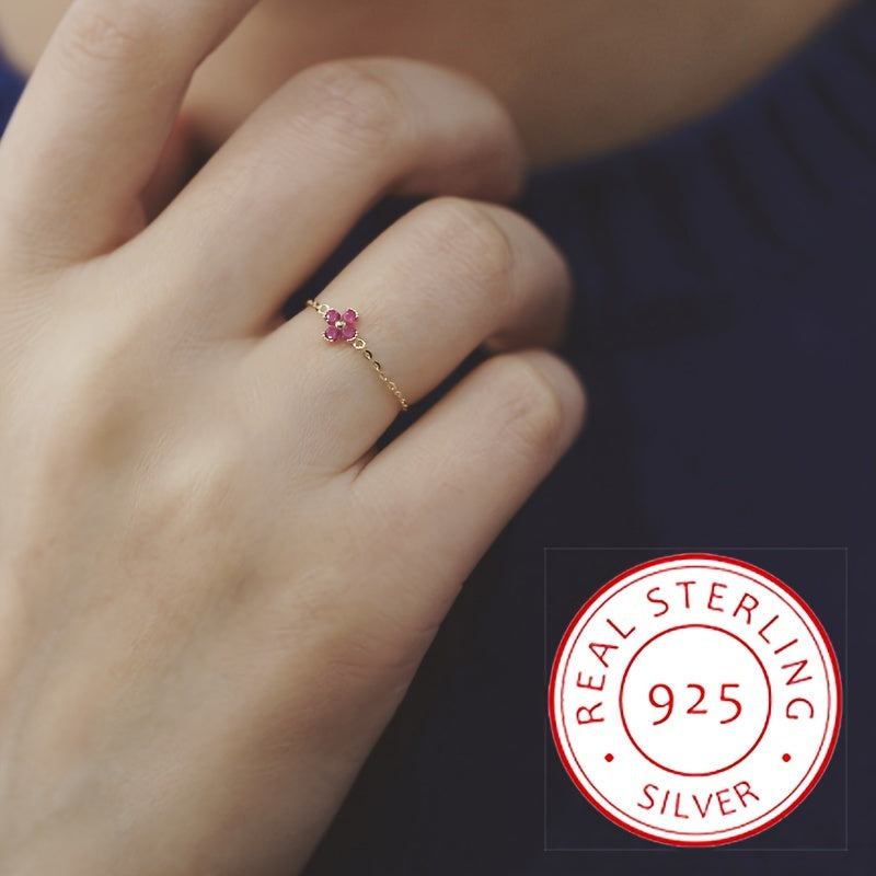 Adjustable open ring made of 925 sterling silver adorned with a moon and flower charm, perfect for women who love elegant and unique fashion jewelry. Weighing in at 2.3 grams, this stunning piece features a pull chain for easy adjustment and can be worn