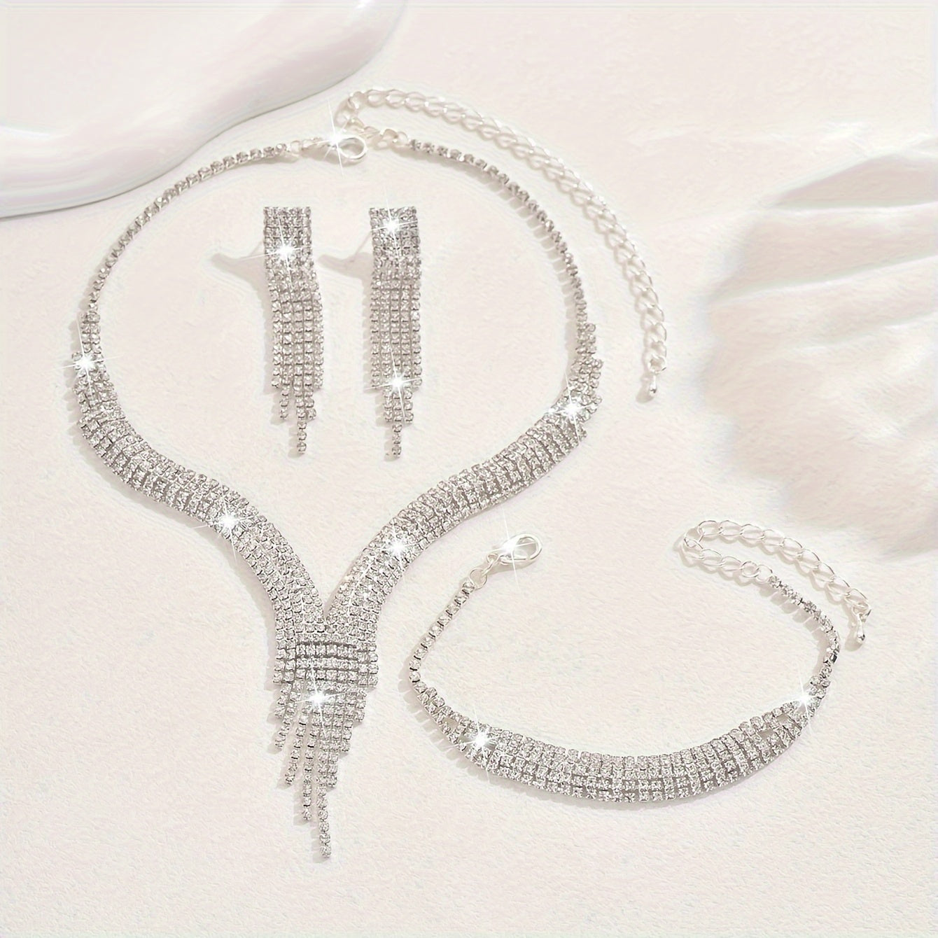 Stylish V-Shaped Necklace Set with Tassel, Bracelet, and Earrings, Featuring Synthetic Gemstones and Rhinestone Accents, Finished in Silver Plating on a Copper Base. This Set is Perfect for Everyday Wear or Special Occasions, Suitable for All Seasons and