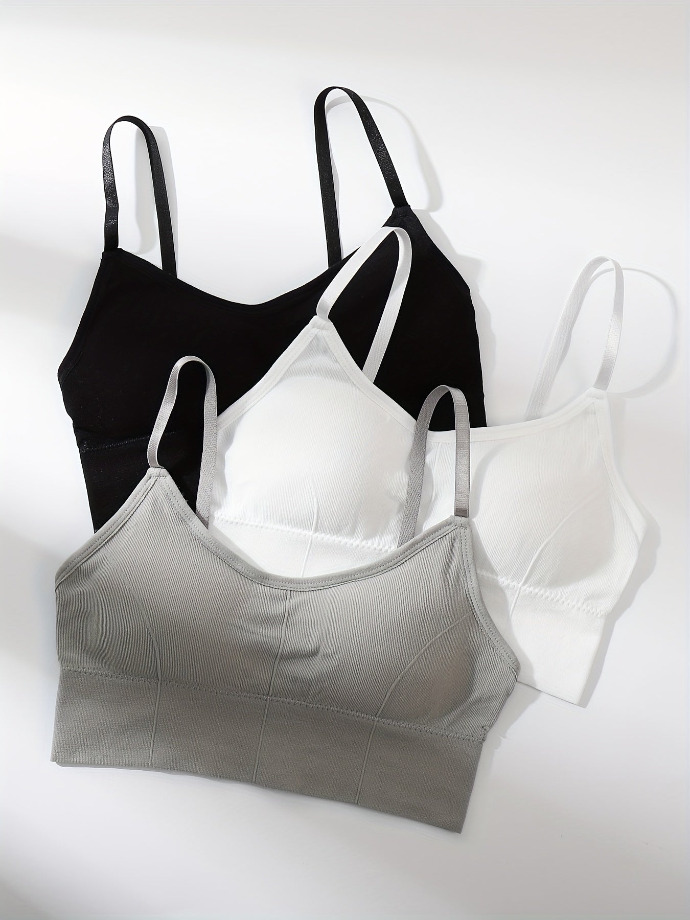 3 Simple solid cami tops that are soft, comfy, and versatile, perfect for women's lingerie and underwear.