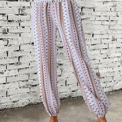 Ethnic style printed pants for women with pocket, button, and elastic waist in plus-size.