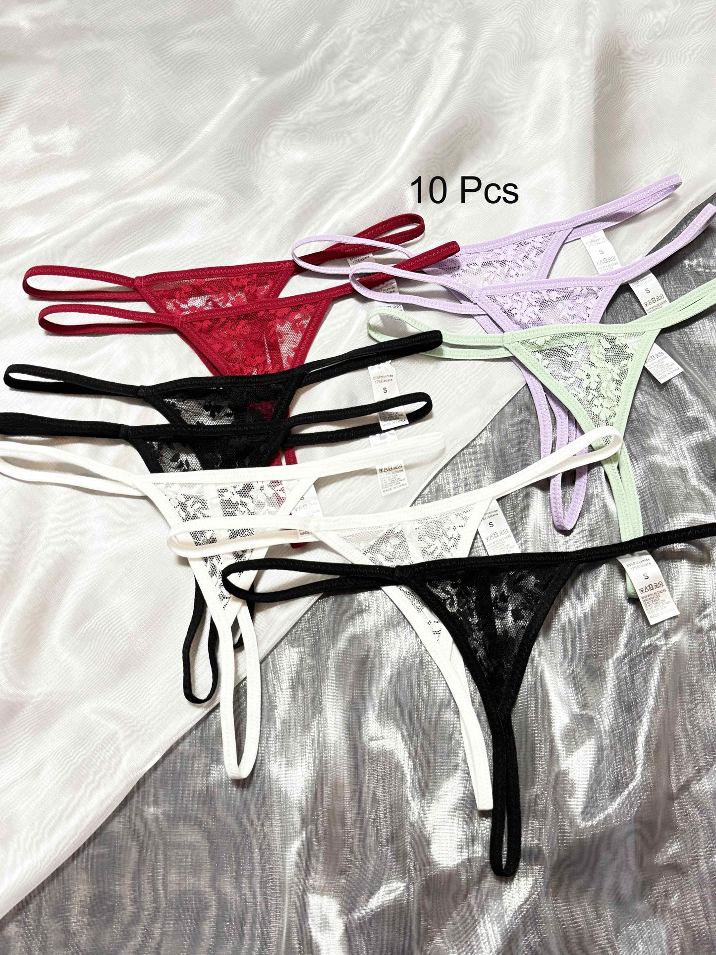 10-pack of sexy lace thong panties for women, low-rise polyamide fabric, transparent triangle design, adult theme, solid color with lace detailing