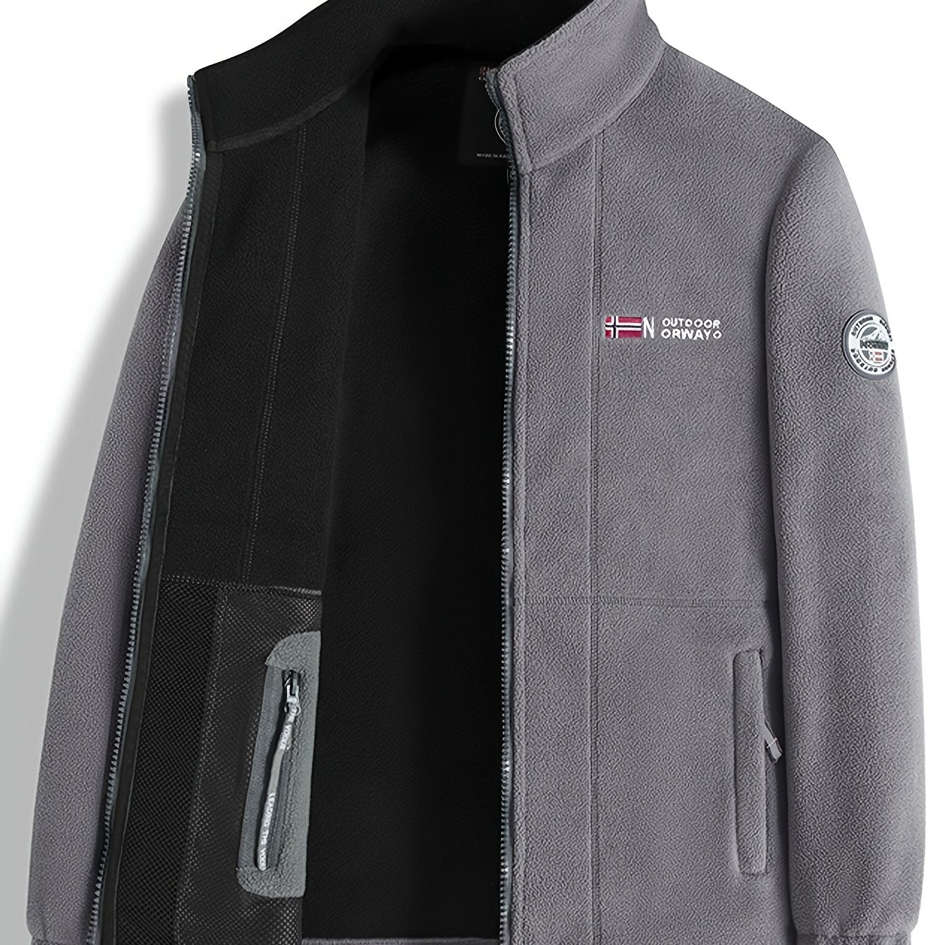 Men's winter fleece jacket with stand collar and zippered pockets, ideal for outdoor activities. Thick, windproof, and warm. Made from polyester fleece.