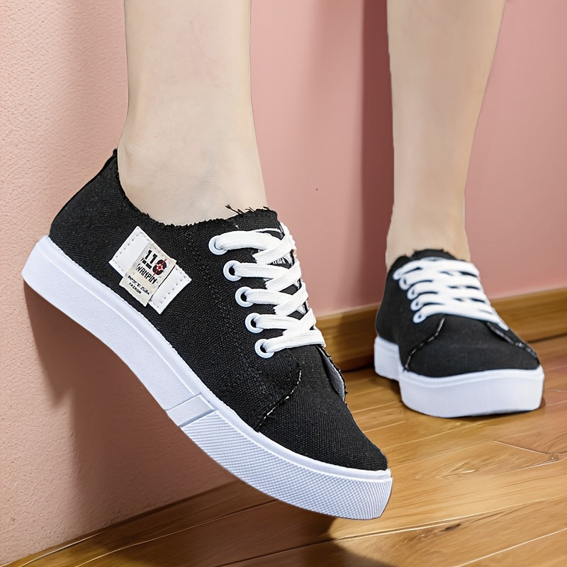 1 pair of women's casual canvas sneakers with round toe, lace-up design, lightweight rubber sole, and fabric insole.