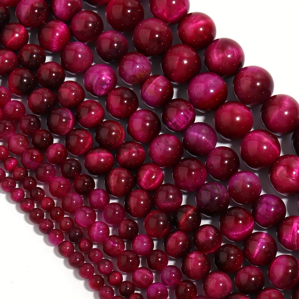 Smooth round beads of natural rose red Tiger's Eye in various sizes (4/6/8/10/12mm) for DIY jewelry making bracelets and necklaces.