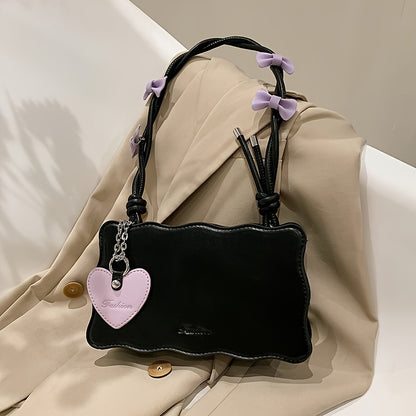 Baguette shoulder bag made of PU material with butterfly bow accents. Versatile and chic fashion accessory.