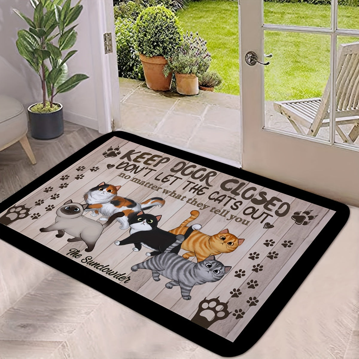 Welcome your guests with this whimsical cat-themed welcome mat featuring cute cartoon cats and paw prints. Made of non-slip, machine washable polyester, this door mat is perfect for both indoor and outdoor use. The black mat is complemented by a wooden