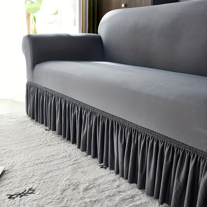 Elastic sofa cover with skirt, universal for all seasons, suitable for living room, office, and home decor.