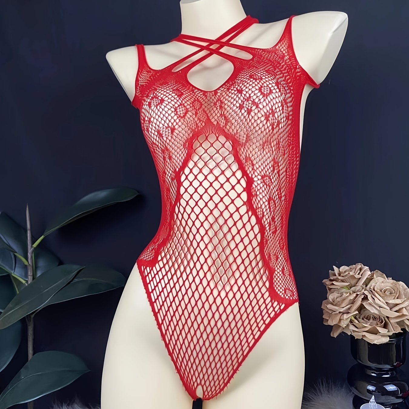 Red lace mesh bodysuit for women with hollow-out design, made of nylon. Features a tight and cropped style in knitted fabric.