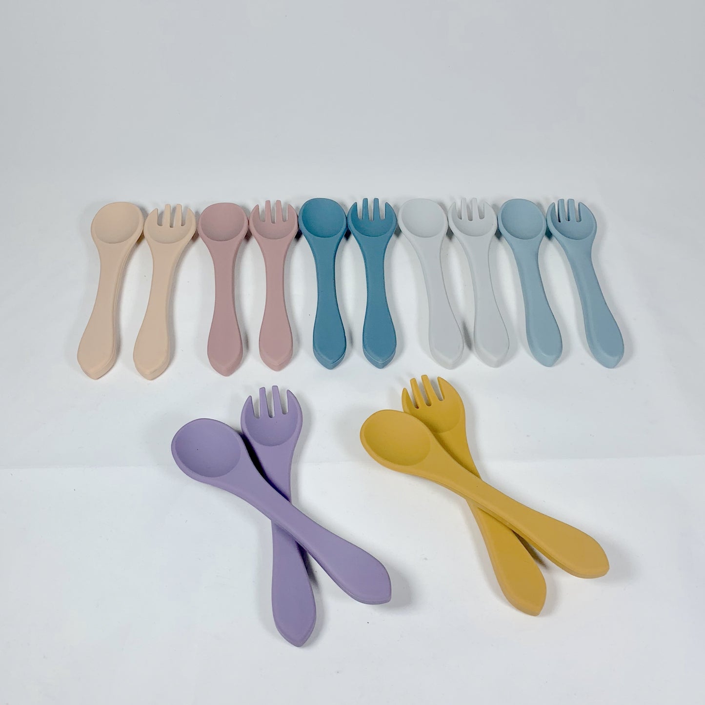 Children's flatware set with silicone fork and spoon, ideal for baby feeding.