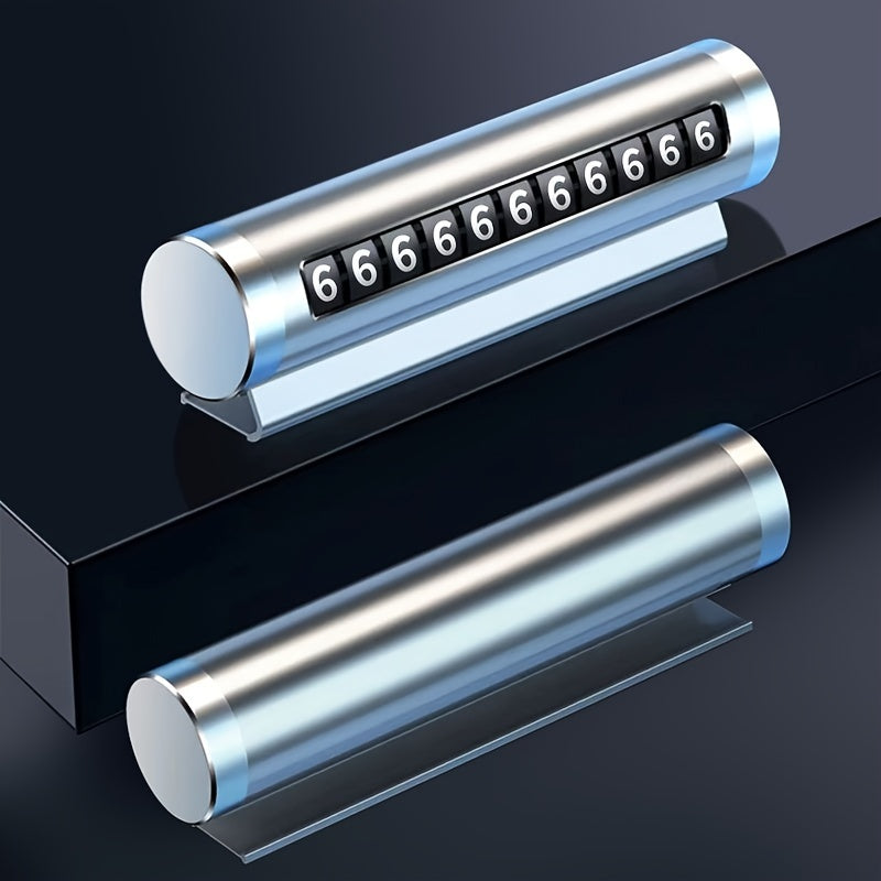 Device for temporarily moving the mobile phone number plate on a car. Fits inside car and has 11-digit number.