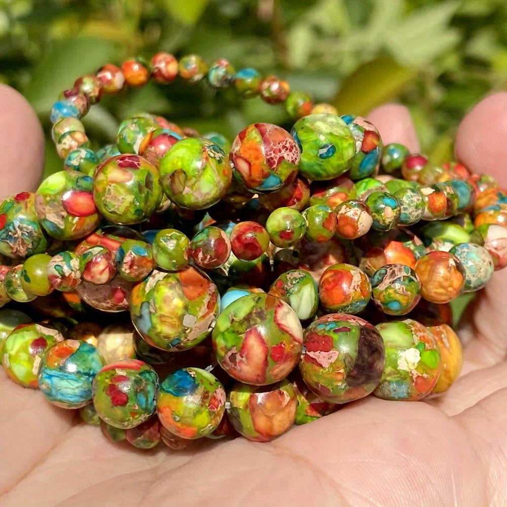 TeoWaki offers a variety of natural and colorful sea sediment turquoise stone beads in sizes 4mm, 6mm, 8mm, and 10mm. These round loose beads are perfect for creating your own jewelry pieces like necklaces, bracelets, and earrings. Add a touch of