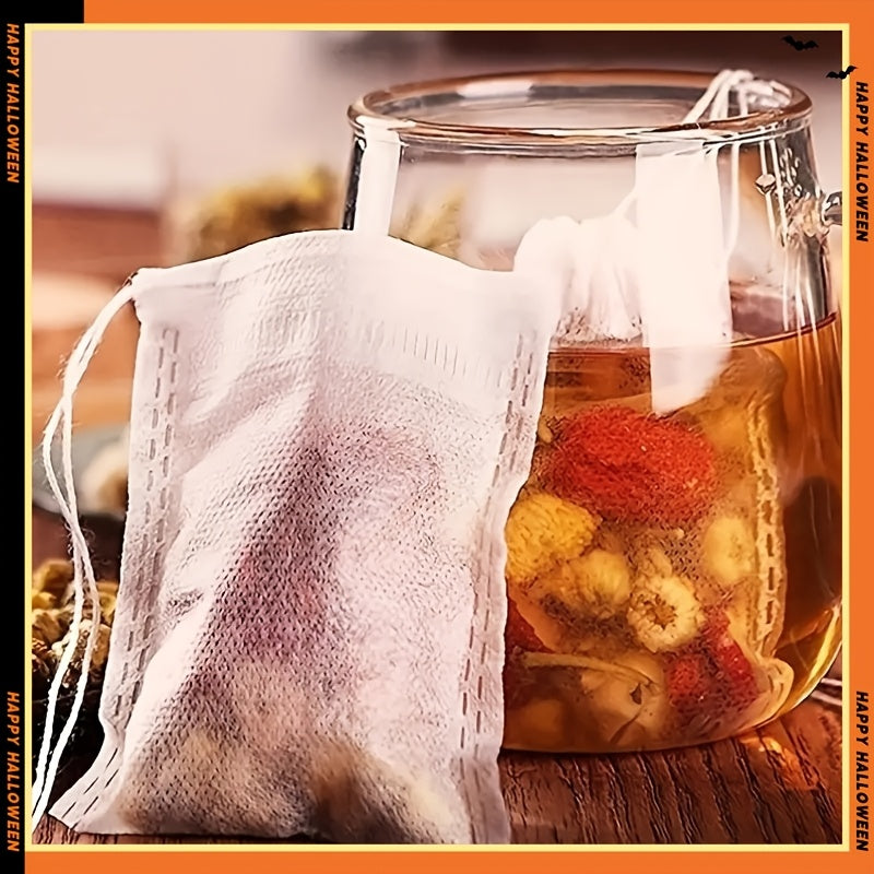 Pack of 100 non-woven tea bags with drawstring, perfect for spices, herbs, and floral teas. Easy to use and made of durable cloth material.