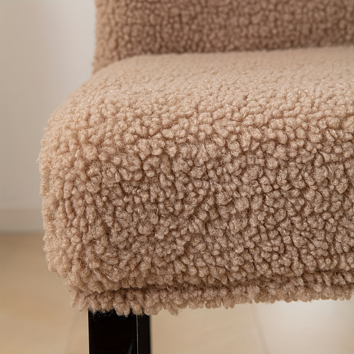 Stretch Sherpa chair cover with removable elastic slipcover, pet-friendly and machine washable. Made with a polyester and spandex blend, designed for home, restaurant, office, or banquet use. Available in multiple colors.