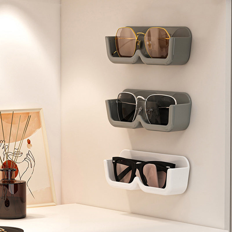 1 piece of Space-Saving Wall-Mounted Eyeglasses Holder, Stylish Display & Storage Tray without the need for drilling, made of plastic. Ideal for organizing women's fashion accessories and eyewear.