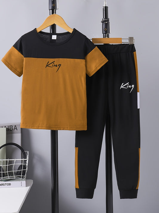 Boy's casual co-ord set with KING letter print color block tee and jogger pants, ideal for daily and outdoor wear.