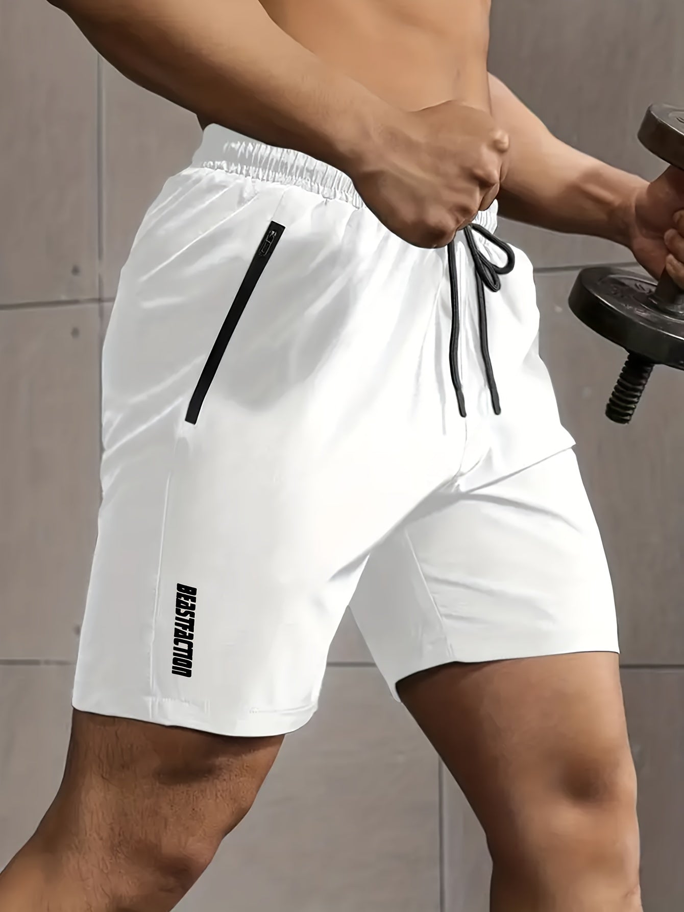 Solid men's shorts with zipper pockets, elastic waist drawstring for summer fitness.