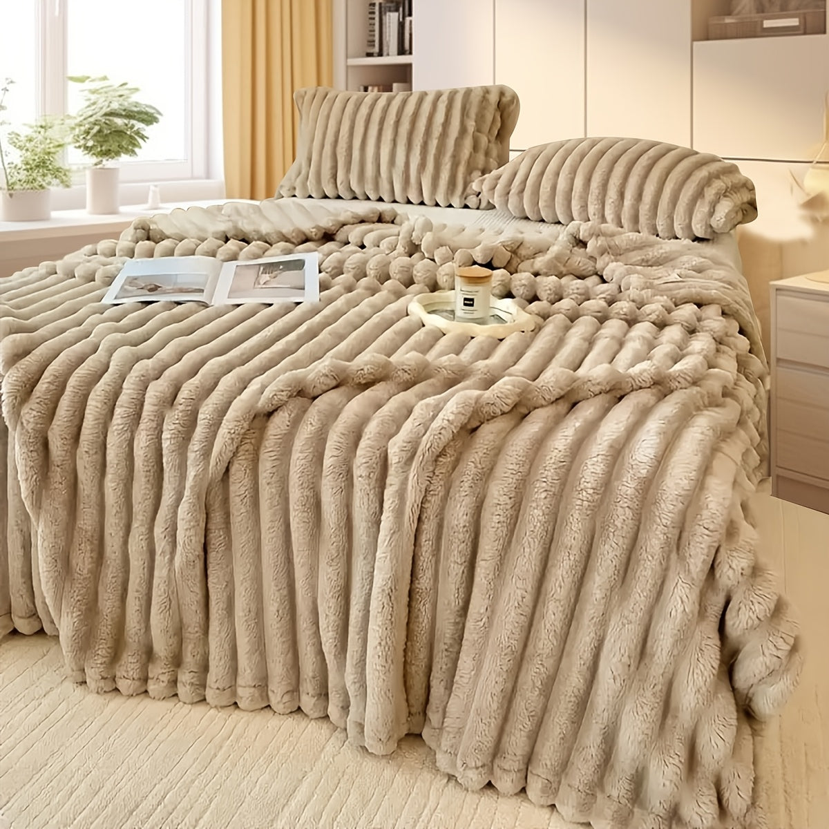 Upgrade your comfort with this dual-sided striped fleece throw blanket. The ribbed texture adds a touch of luxury, while the cozy and warm material makes it perfect for any season. Whether you use it for naps, in the office, or in the bedroom, this