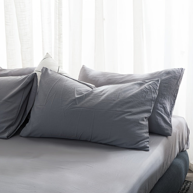 Enhance your bedroom, guest room, or hotel with our 2-piece set of solid color versatile pillowcases. Made from soft and breathable material with a frosted treatment, these pillowcases are conveniently machine washable. Available in three classic colors