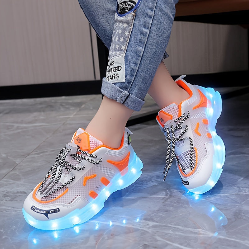 Children's LED light-up sneakers with breathable mesh, non-slip soft sole, and trendy street style for nighttime visibility, ideal for outdoor play and sports in white/blue/orange designs.