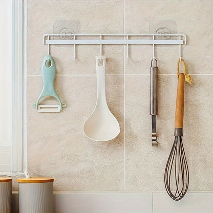 10 heavy-duty self-adhesive hooks for kitchen, bedroom, bathroom, and office. Waterproof and clear plastic organizer with contemporary design. Easy installation with no drilling required. Sleek and durable design for space-saving storage. Perfect for