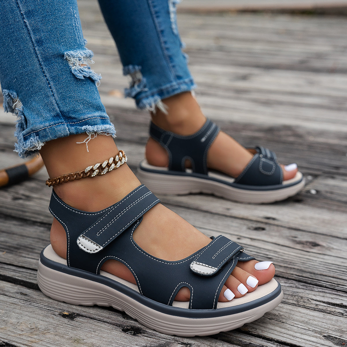 Women's black wedge sandals- breathable PU upper, open toe, ankle strap, hook-and-loop closure, solid color platform heel for beach wear.