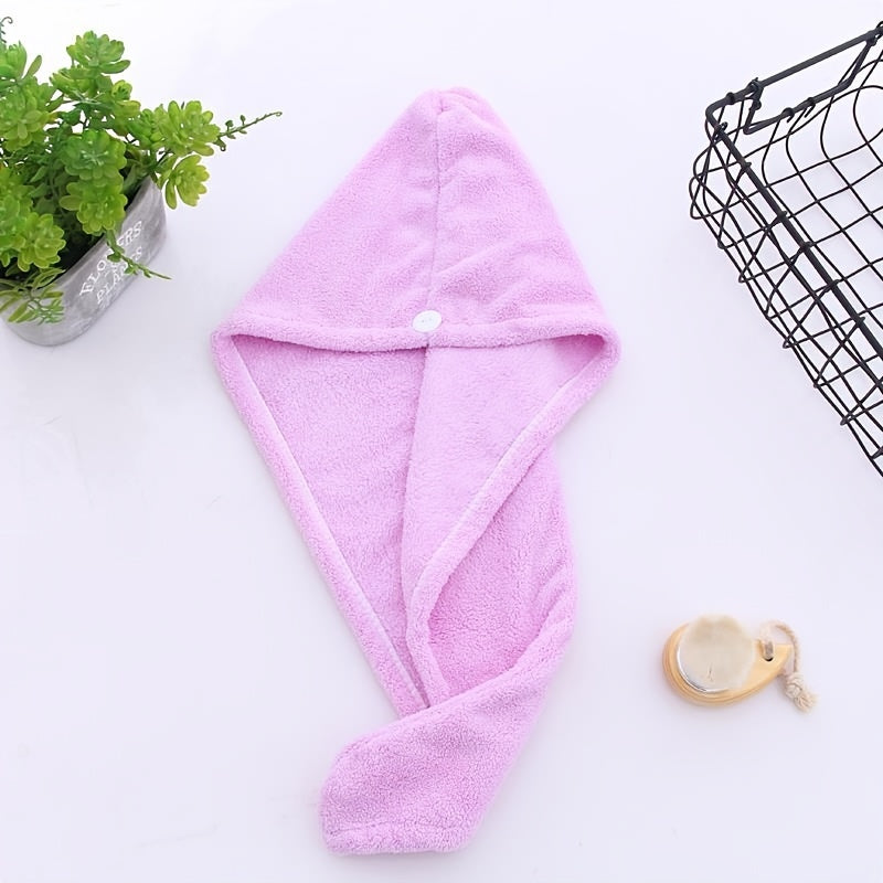 Super absorbent hair towel made of soft and water-absorbing microfiber with anti-frizz and anti-static features, perfect for bathroom use. Made of 100% polyester.