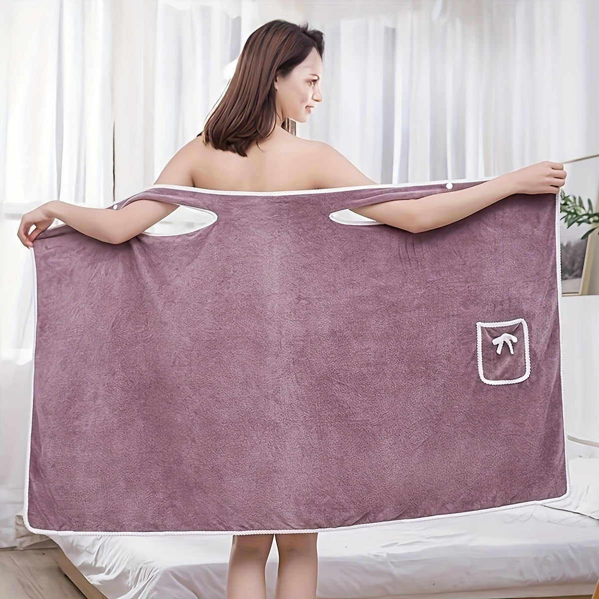 Soft, absorbent women's shower wrap with pockets, ideal for home and salons, in modern purple design.