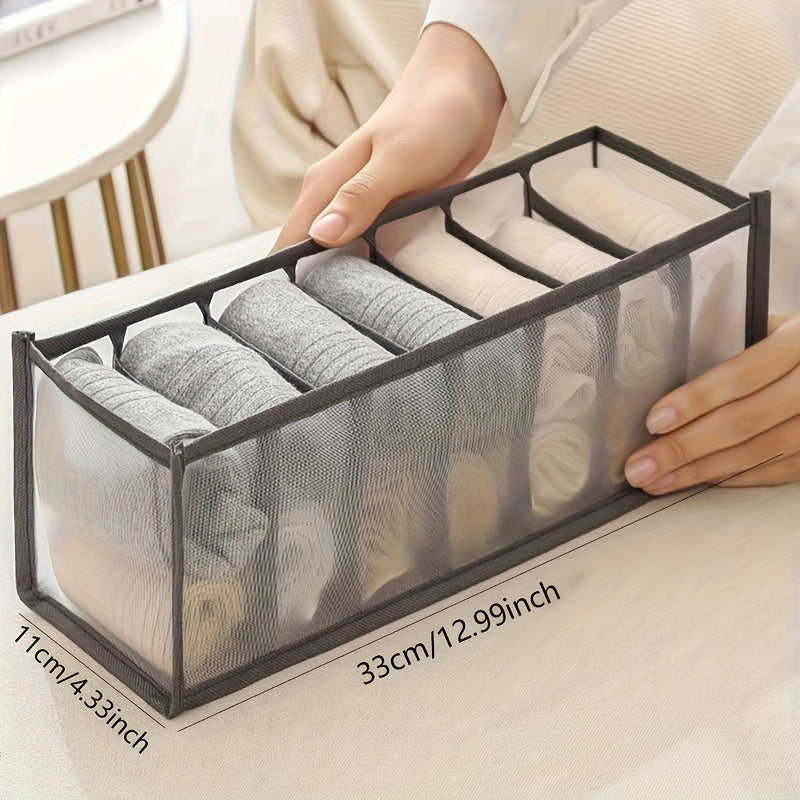 7-grid organizer for underwear and socks made of durable mesh material, designed for easy access and space-saving storage in the home, bedroom, or dorm.