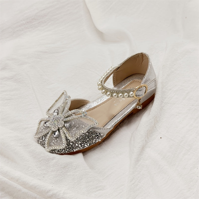 Girls' sandals with fake pearl and sequin embellishments.