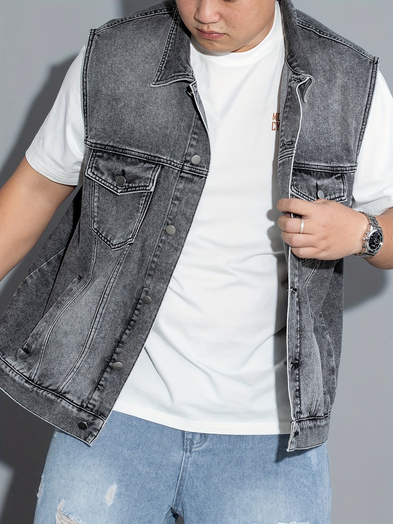 Men's sleeveless denim vest with flap pockets, button closure, lapel collar. Machine washable. Ideal for spring/summer/fall. Plus size.